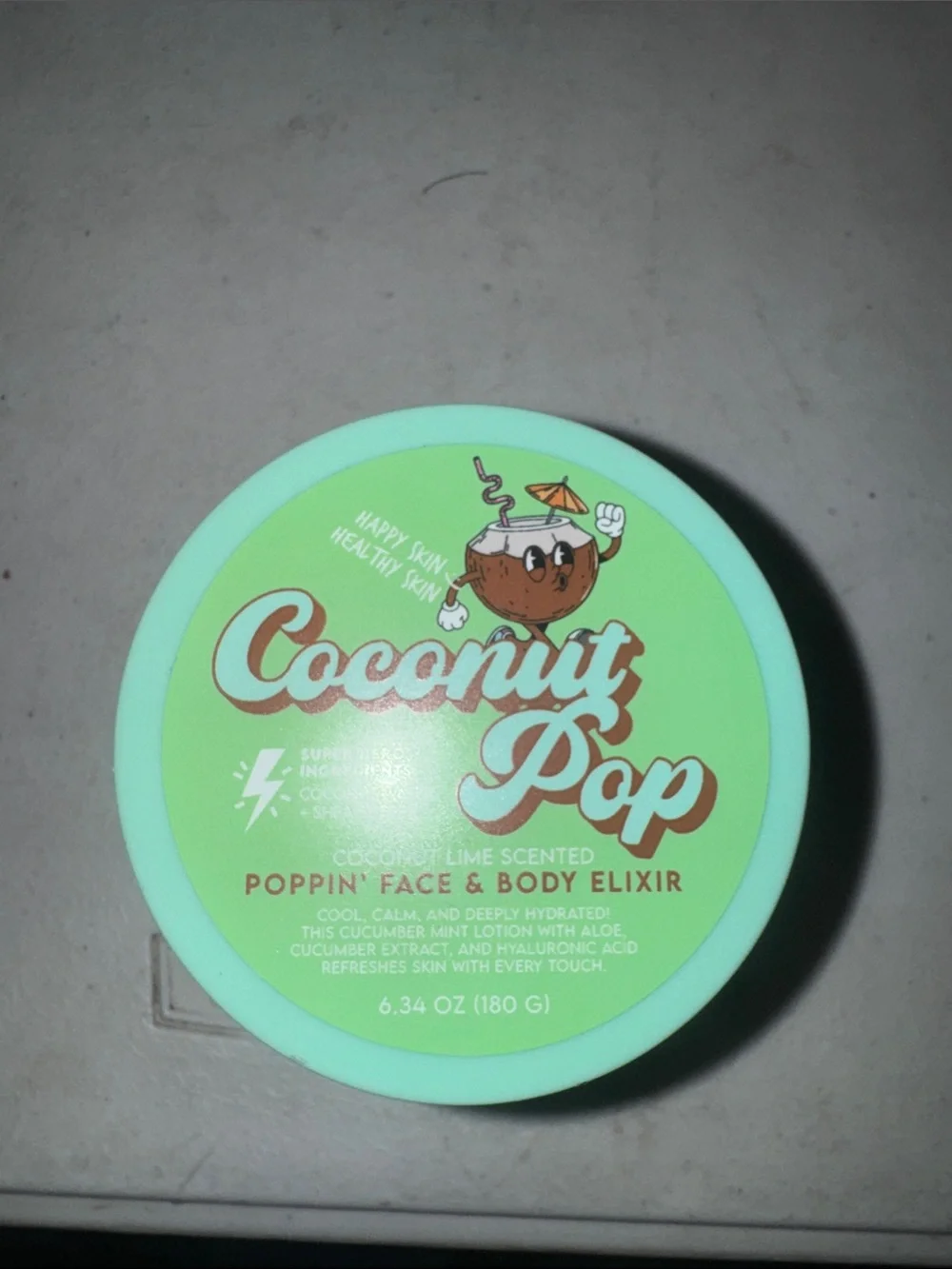Splash Coconut Pop Poppin' Face & Body Elixir - Mint Green and Brown
